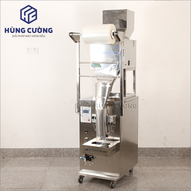 2. May-dong-goi-hat-dung-can-dinh-luong-qb-40 