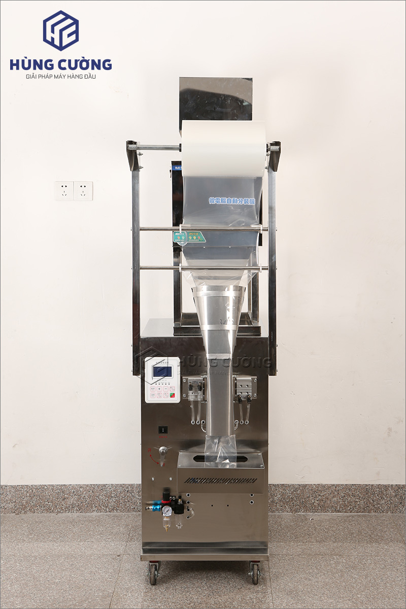 4. May-dong-goi-hat-dung-can-dinh-luong-qb-40 