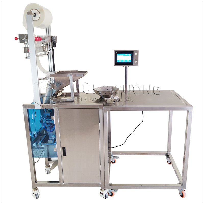 2. May-dong-goi-hat-can-dinh-luong-thu-cong-lqj-2000