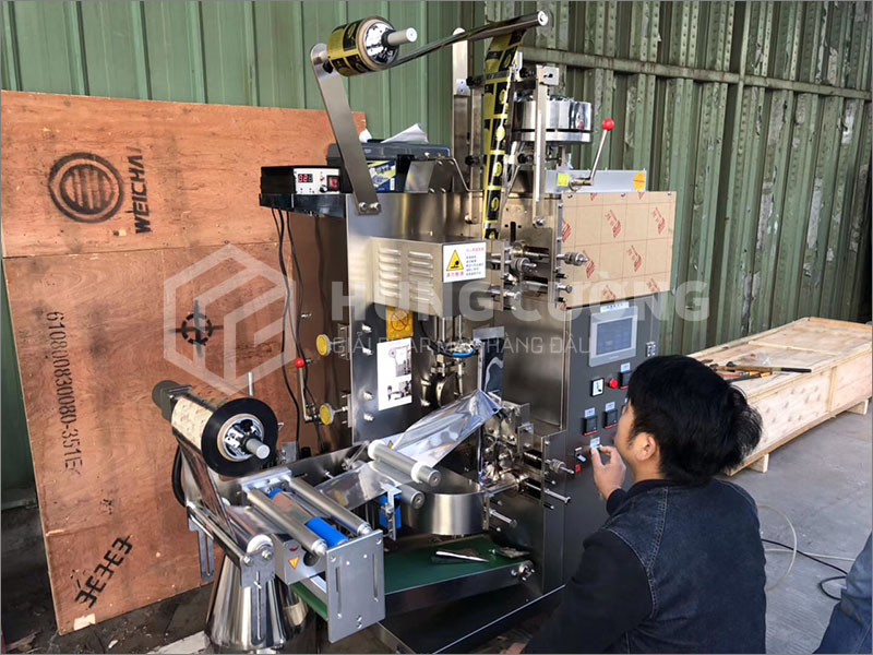 15. May-dong-goi-tra-tui-loc-co-tem-chi-ys-169-2-lop-tui