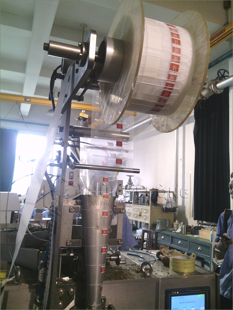 3. May-dong-goi-tra-tui-tam-giac-DXDC50B