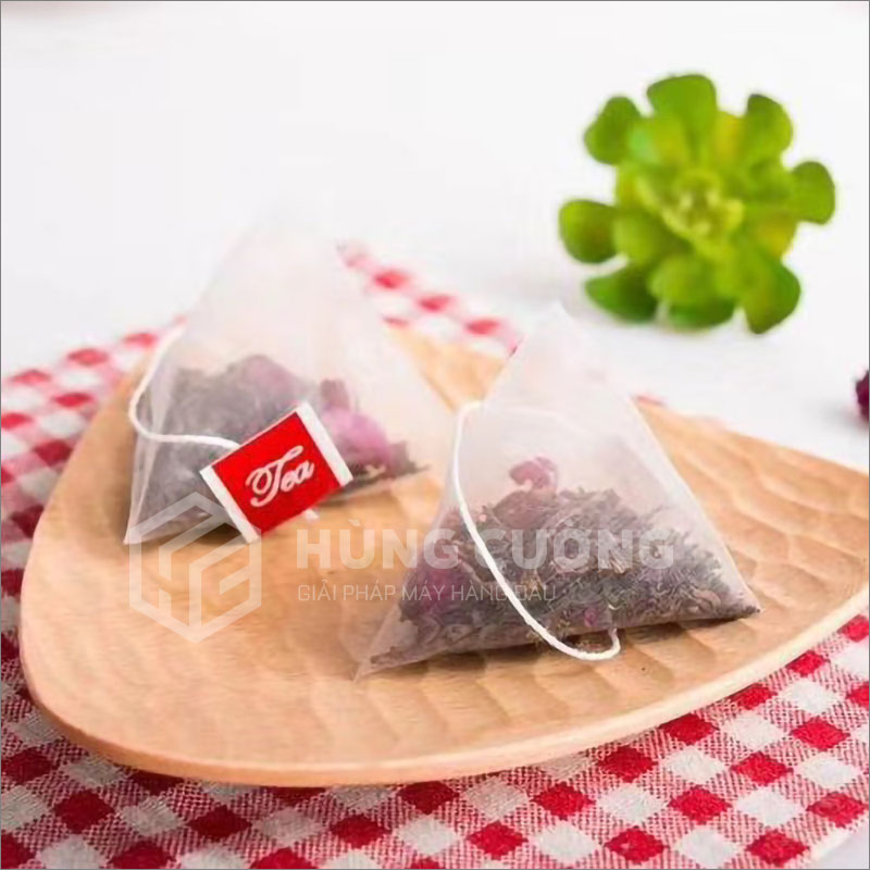 4. May-dong-goi-tra-tui-tam-giac-sjb-02