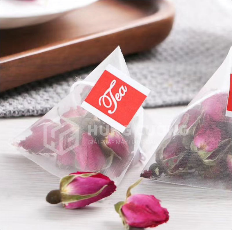 2. May-dong-goi-tra-tui-tam-giac-sjb04a-nw