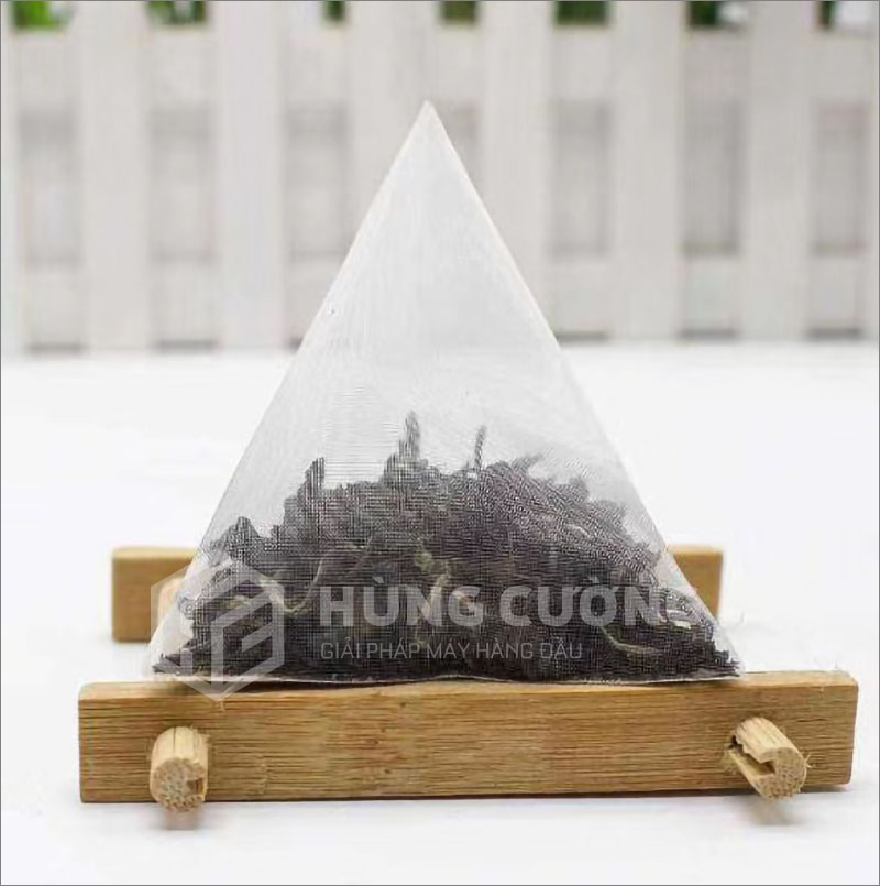 6. To-hop-may-dong-goi-tra-tui-tam-giac-dxdc50b-can-dinh-luong